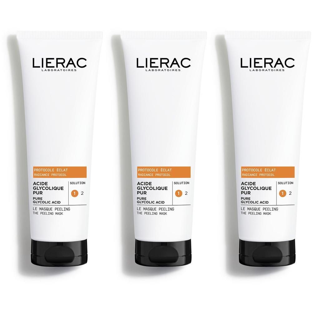 Trois tubes blancs LIERAC Protocole Éclat à bouchon noir, étiquette orange sur le devant.