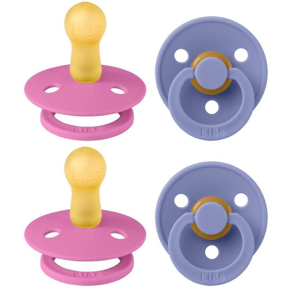 Deux sucettes : une rose à tétine jaune, une lilas à anneau et tétine jaunes. Marque Bibs.