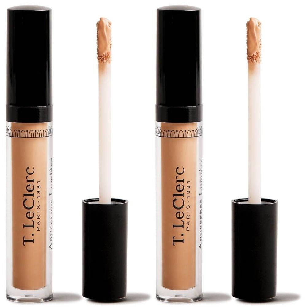 Twee T.Leclerc Concealer pennen in Ambre met zwarte doppen en applicators.