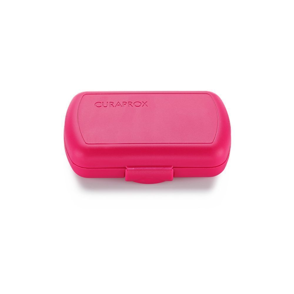 Trousse de voyage fermée rose avec le logo Curaprox.