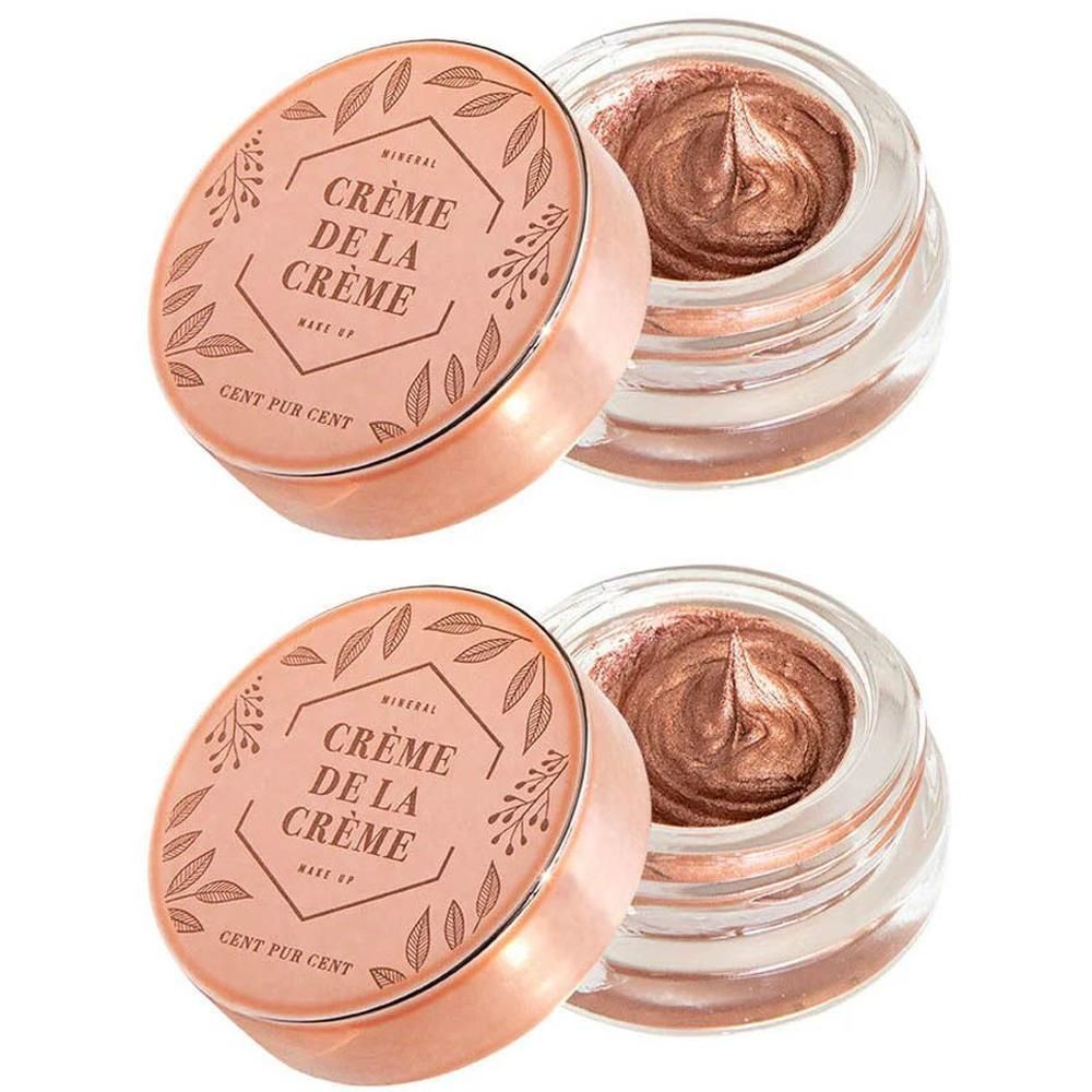Deux pots de crème bronzante irisée, inscription "Crème de la Crème".