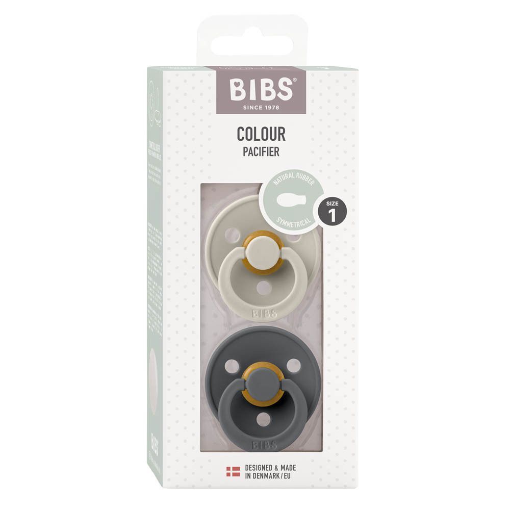 Twee BIBS symmetrische spenen in zandkleur en antraciet, maat 1, in verpakking.