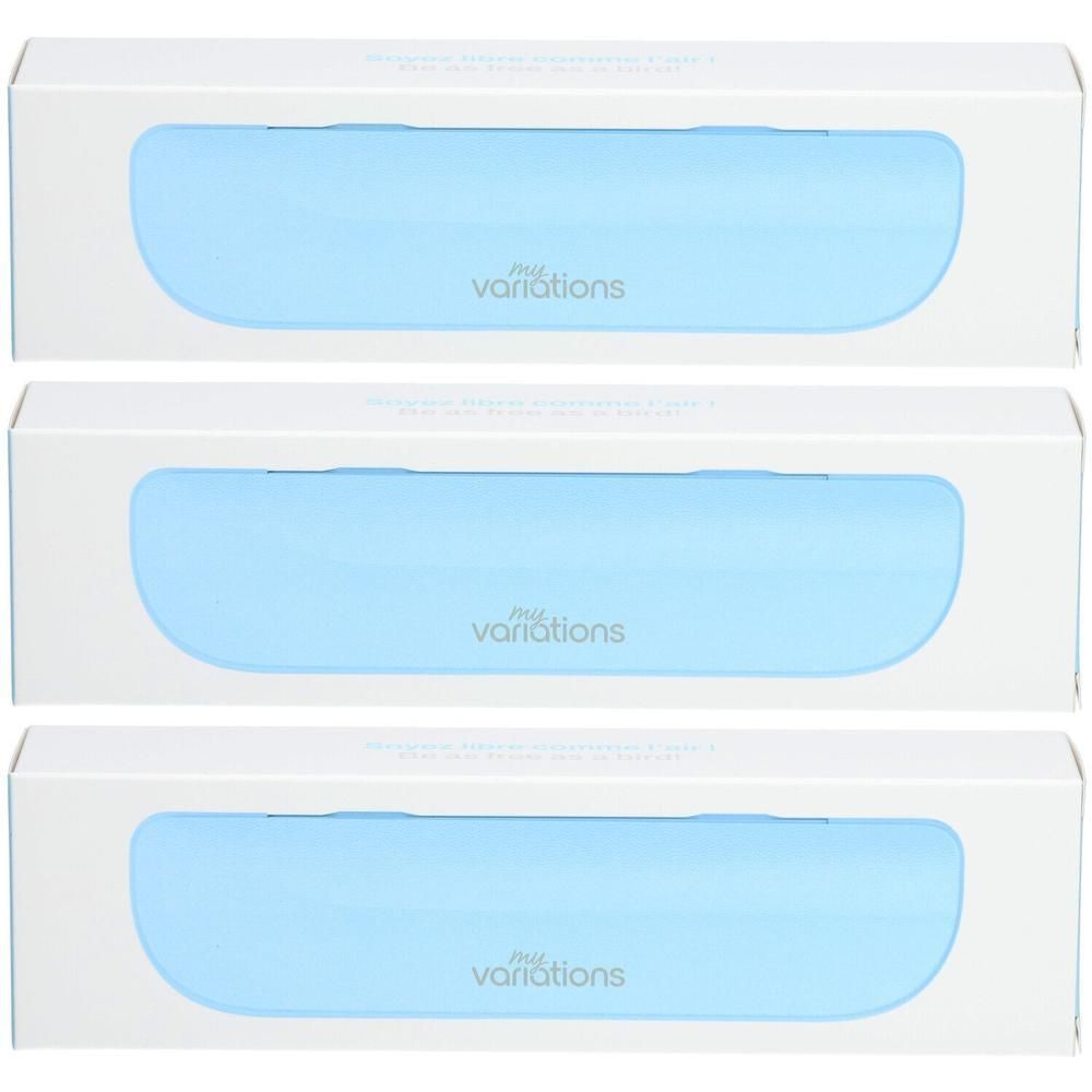 Trois étuis de voyage bleus MyVariations dans des boîtes blanches.