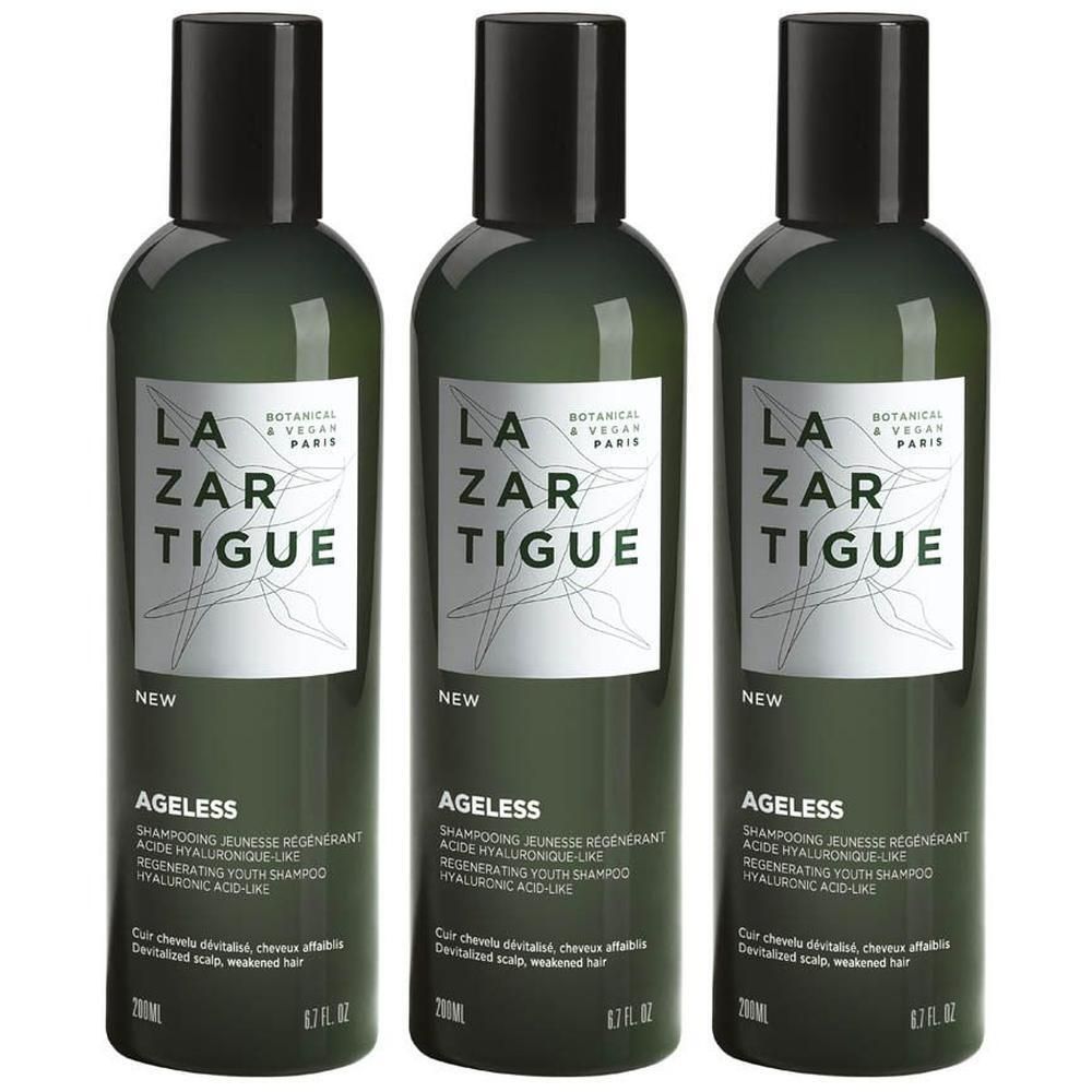 Drie flessen Lazartigue Ageless Shampooing Jeunesse Régénérant Hyaluronic Acid-Like. Donkergroene flessen met wit etiket.