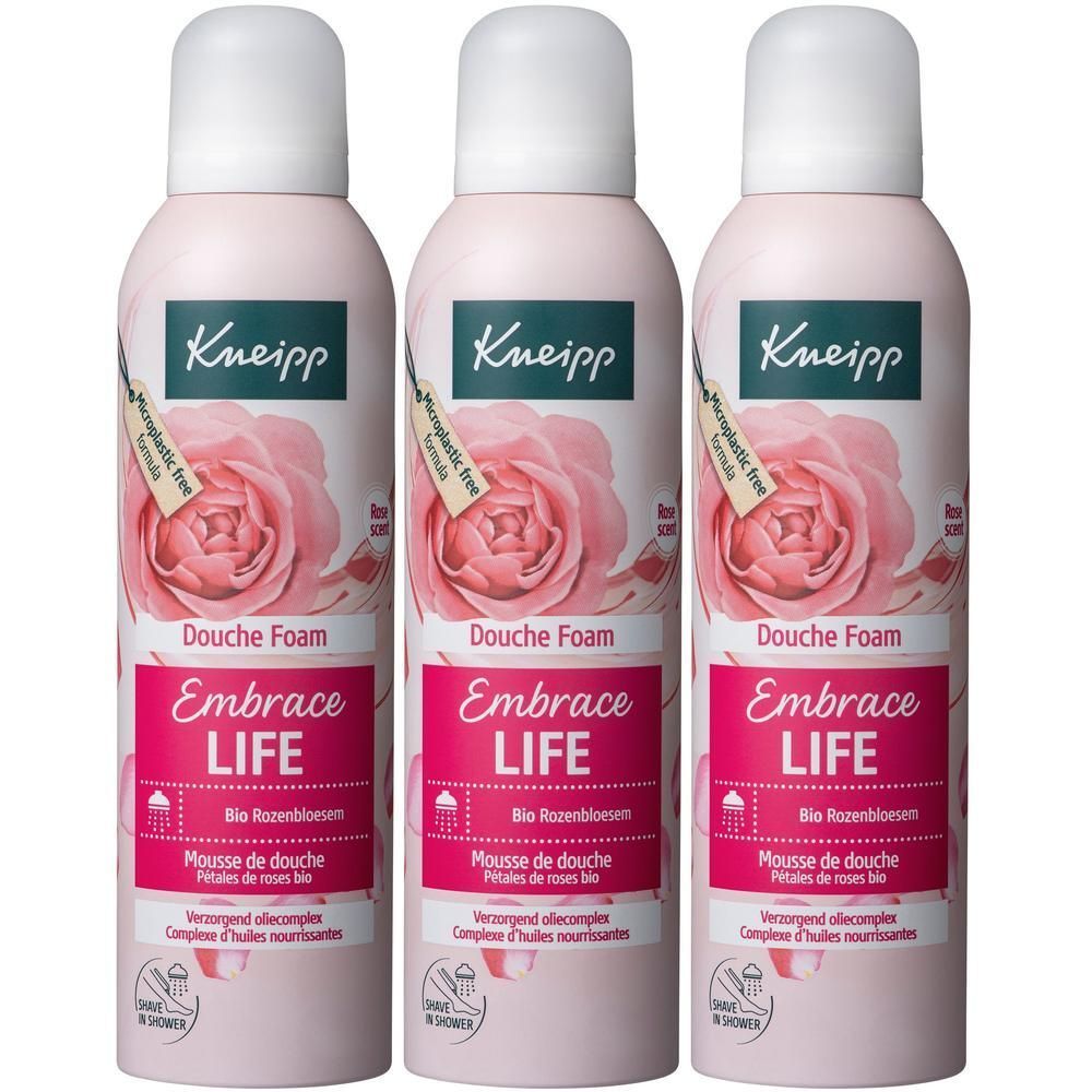 Drie flacons Kneipp Douche Foam Embrace Life met rozenbloesem-motief.