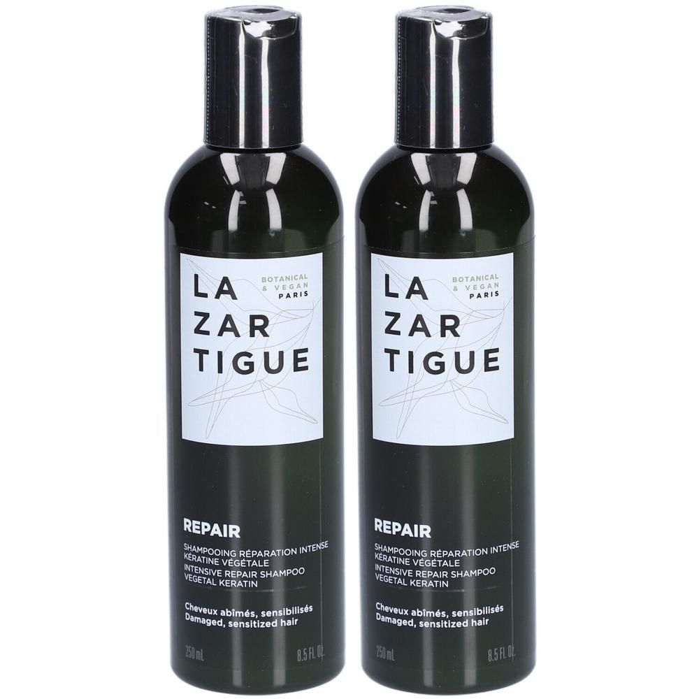 Twee flessen Lazartigue Repair Shampoo met plantaardige keratine voor beschadigd haar.