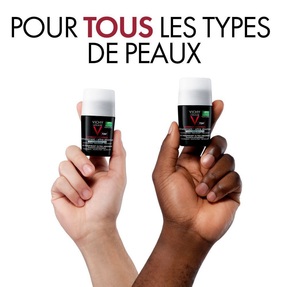 Deux mains tenant un déodorant roll-on Vichy Homme. Pour tous types de peaux.