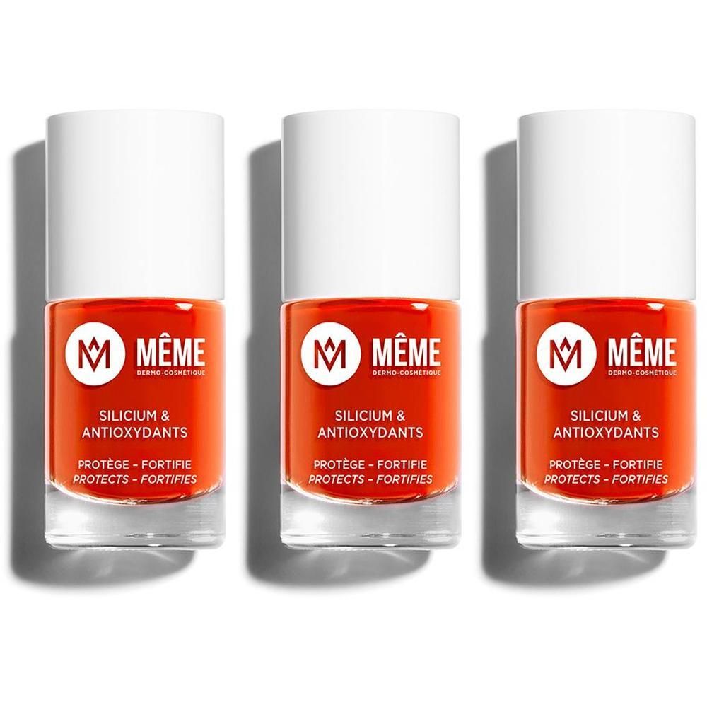 Trois flacons de vernis à ongles orange vif avec silicium et antioxydants. Marque MÊME.