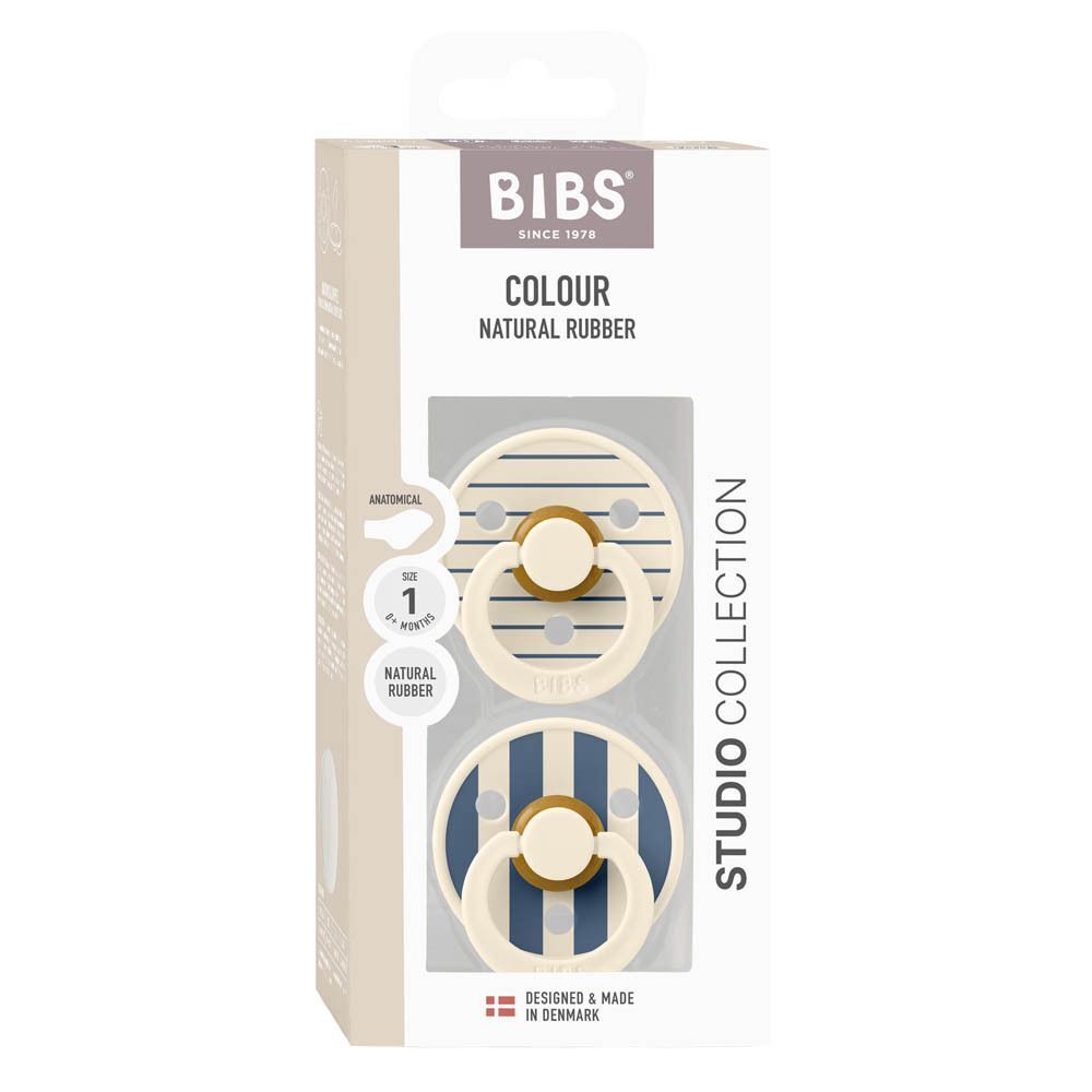 BIBS Colour Studio Collection verpakking met twee spenen: één effen crème, één met blauw-witte strepen.