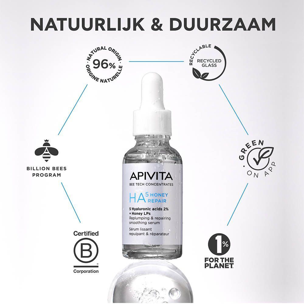 Flesje Apivita HA5 Honey Repair serum met milieu- en duurzaamheidssymbolen.