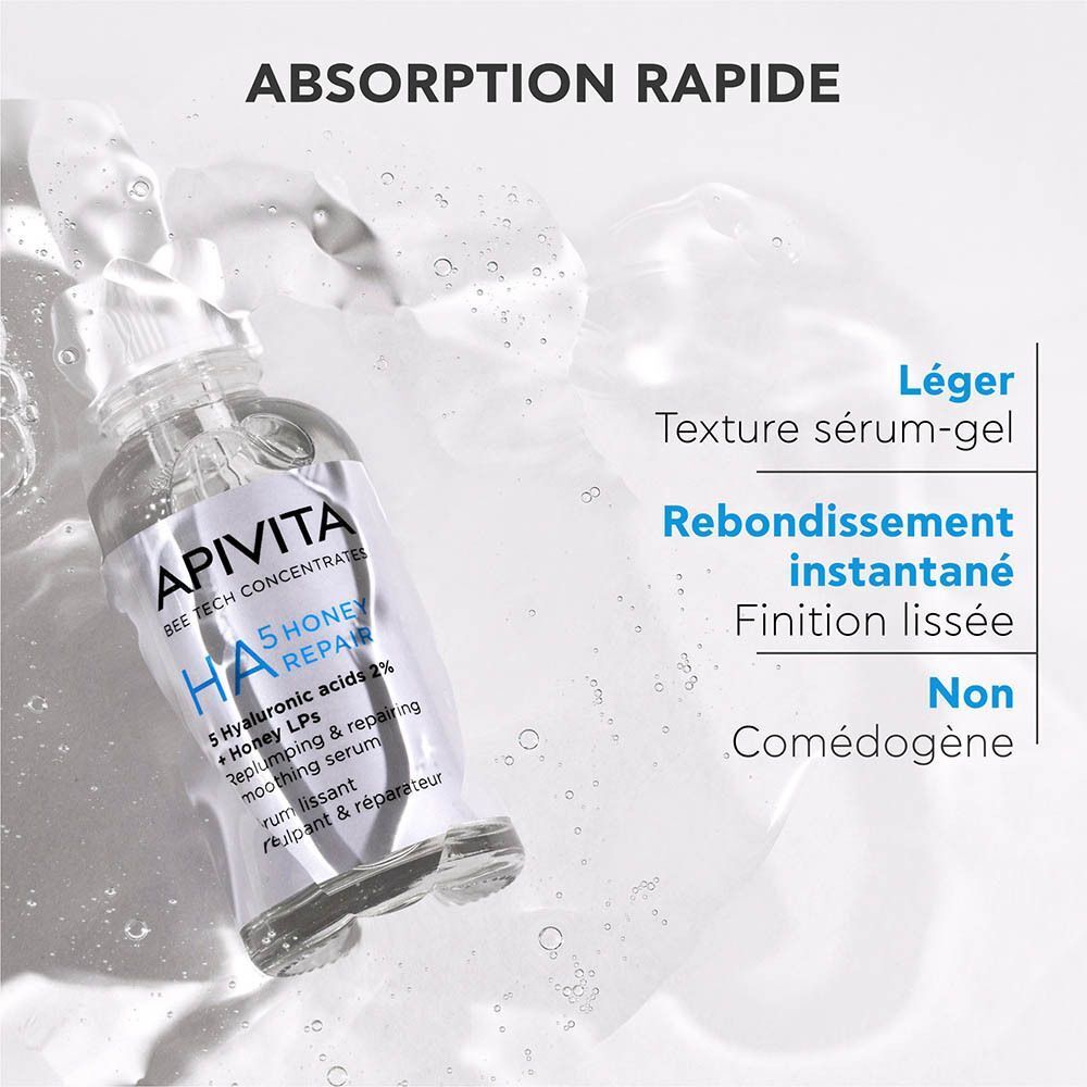 Flacon de sérum Apivita HA5 Honey Repair avec texte sur l'absorption rapide et la texture gel-sérum.