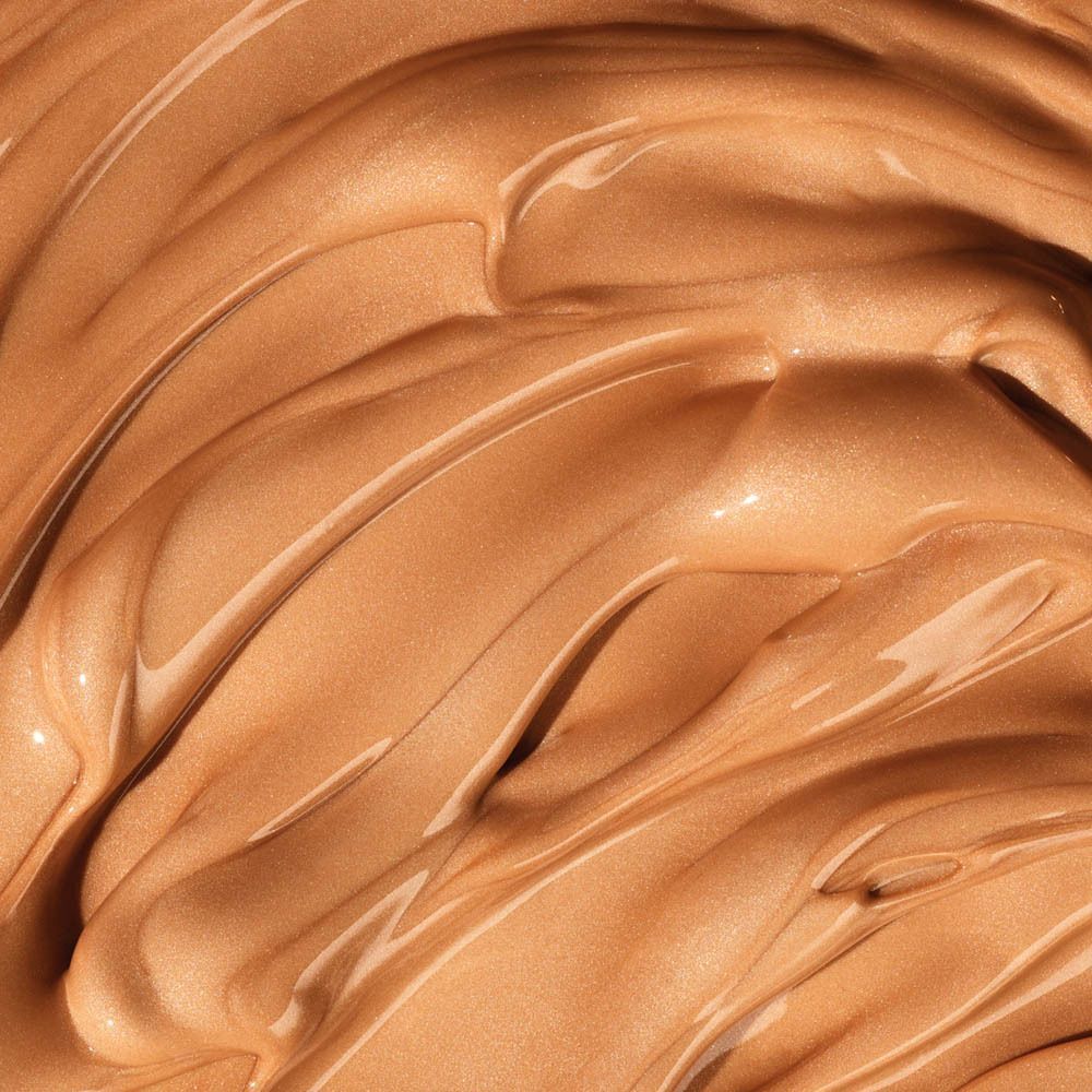 Glanzende, bronzerende crème met glinsterende deeltjes.