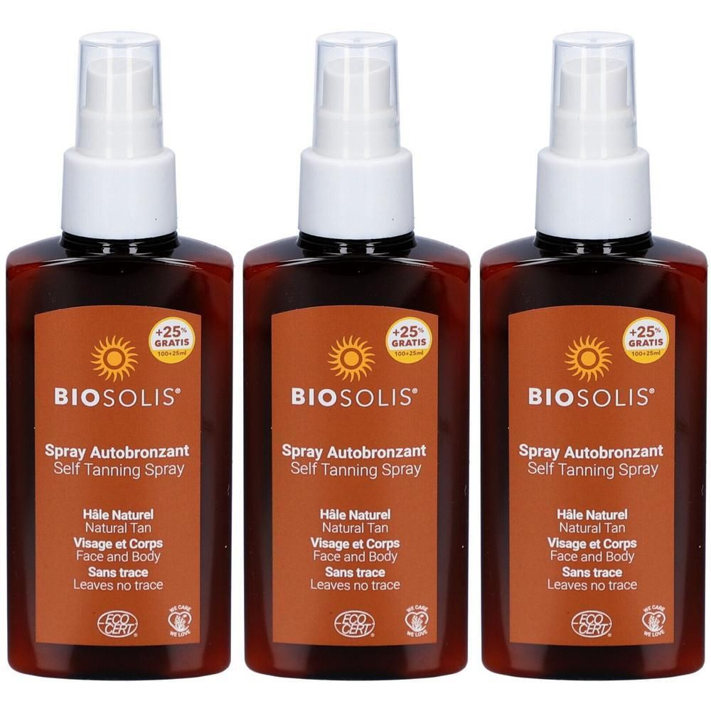 Trois flacons de spray autobronzant Biosolis, flacons marron avec têtes de pulvérisation. Étiquettes avec symbole solaire et informations produit.