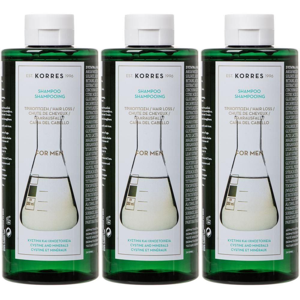Trois bouteilles vertes de Korres Shampooing Cystine & Minéraux Anti-Chute pour Hommes.