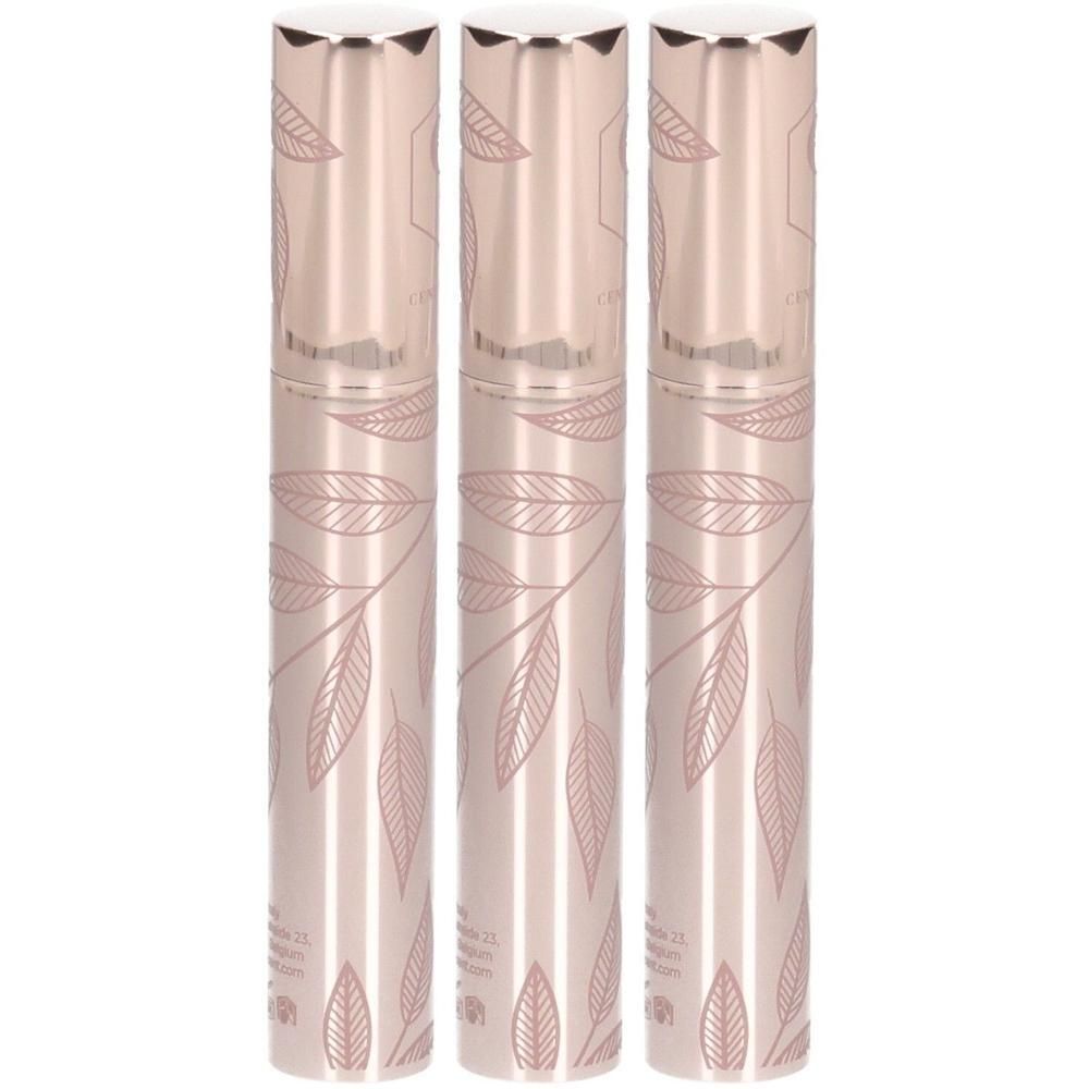 Drie goudkleurige mascaraflesjes met bladerenpatroon.
