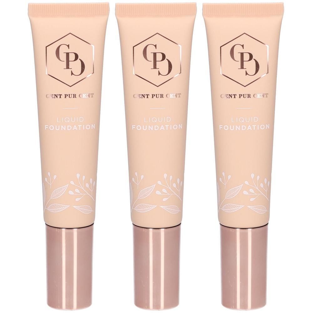 Trois tubes de fond de teint liquide SPF25 avec un design floral.