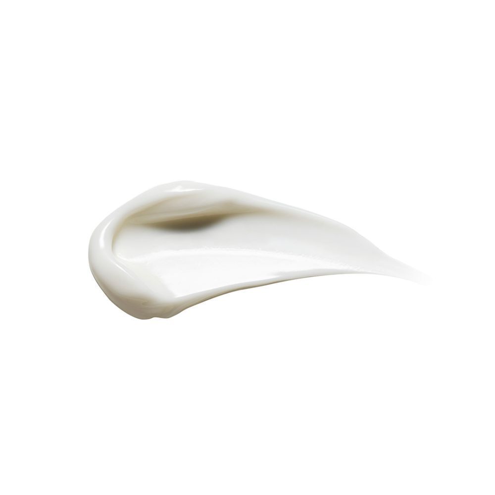 Une touche de crème blanche sur fond blanc.