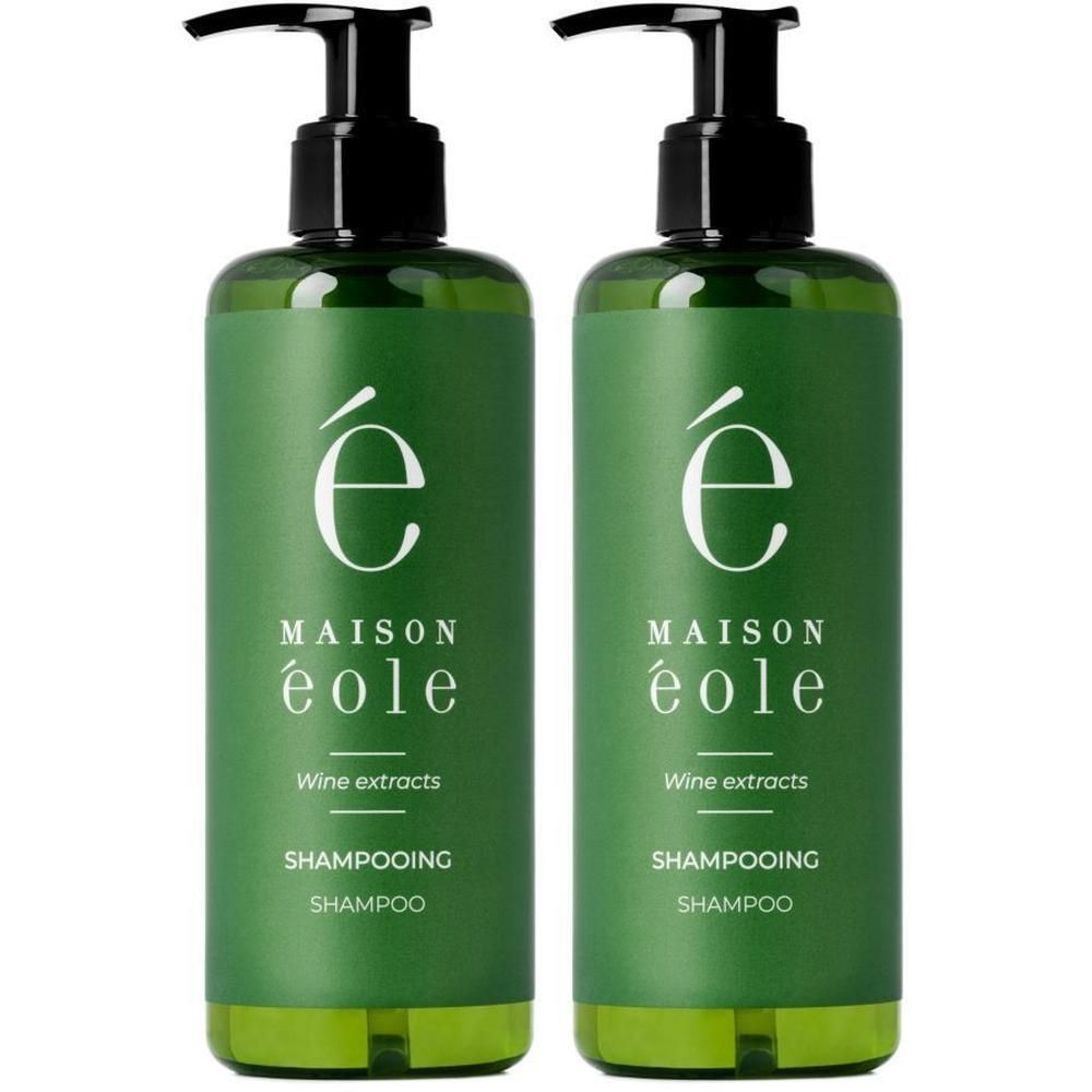 Deux flacons pompe verts Maison Éole Shampooing Volupté avec logo blanc et texte.