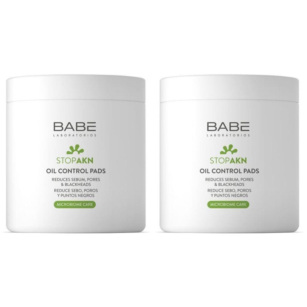 Deux pots blancs de BABE STOPAKN Oil Control Pads. Réduit le sébum, les pores et les points noirs.
