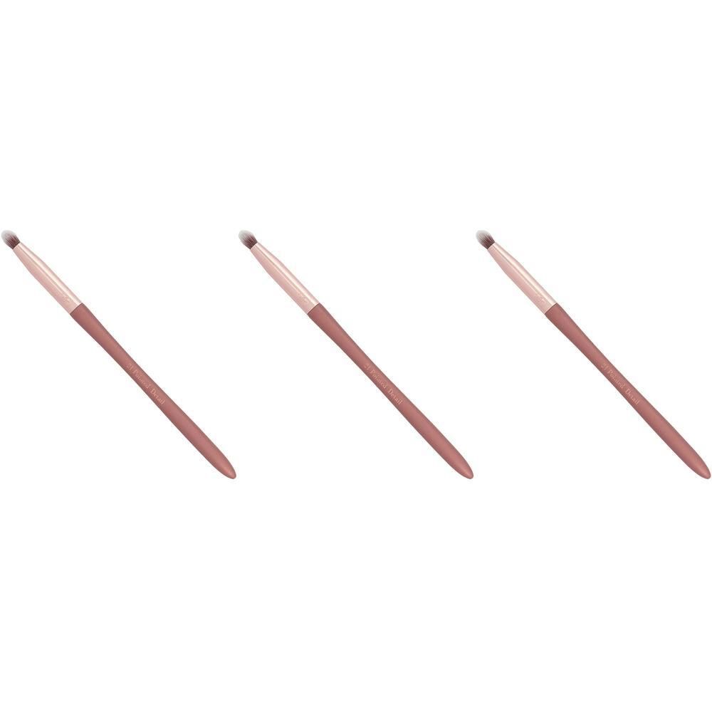 Trois pinceaux fins avec manches roses et poils clairs.