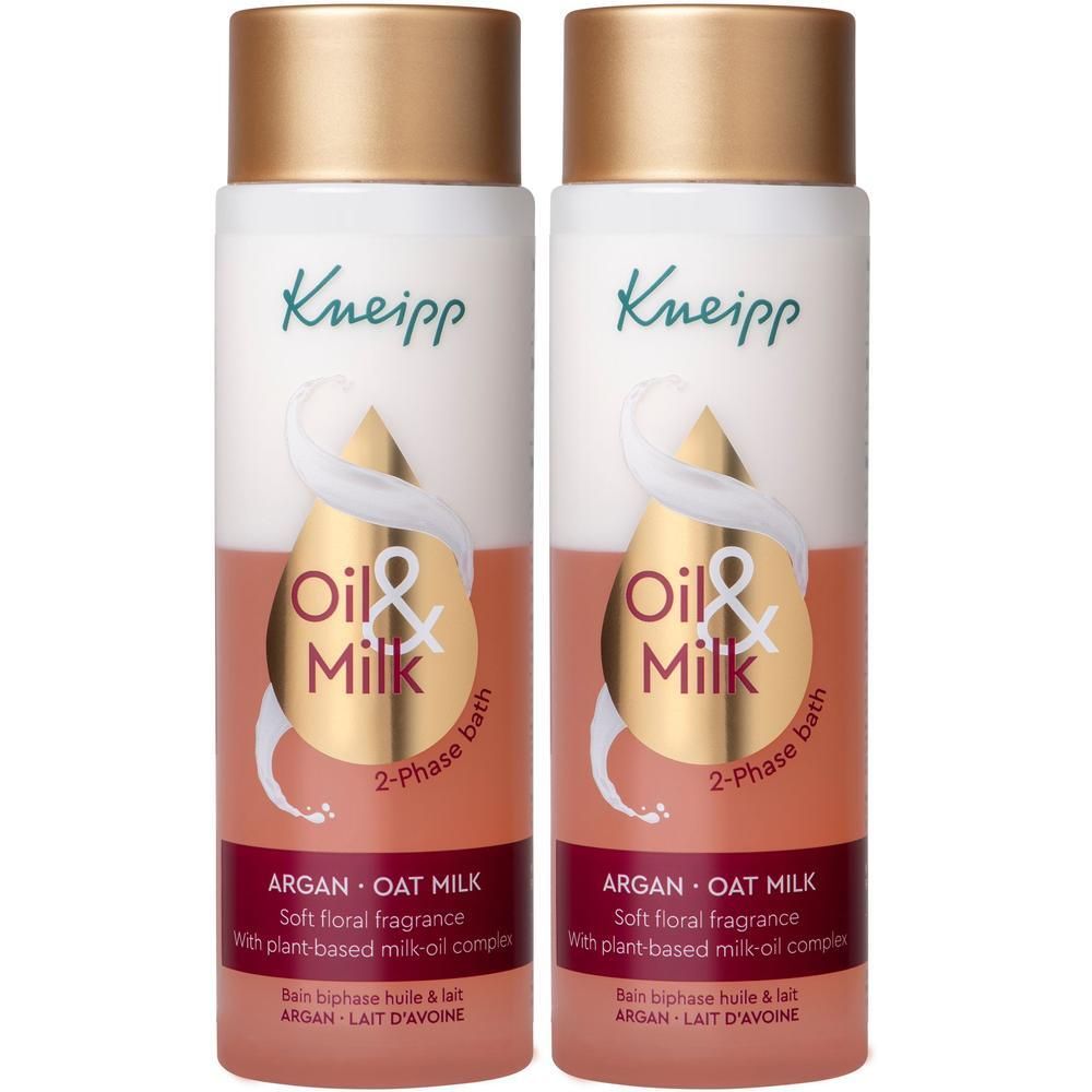 Deux bouteilles d'huile de bain biphasée Kneipp Argan & Lait d'avoine avec bouchons dorés.