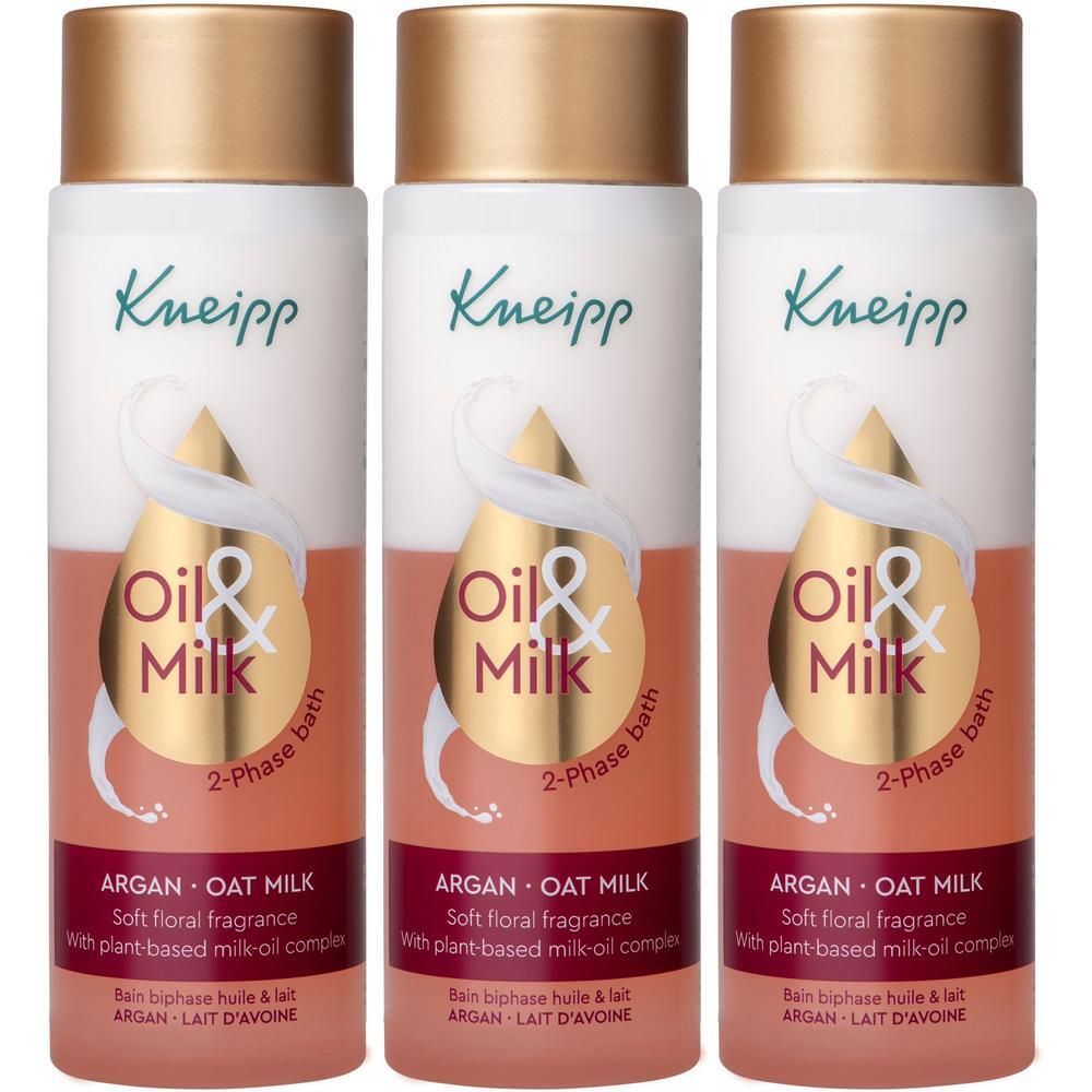 Trois flacons d'huile de bain biphasée Kneipp Argan & Lait d'avoine.