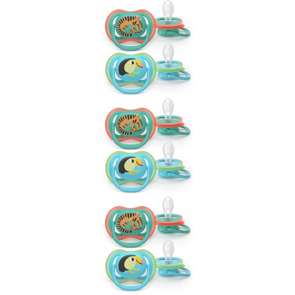 Cinq sucettes avec motifs animaux : léopard et toucan.
