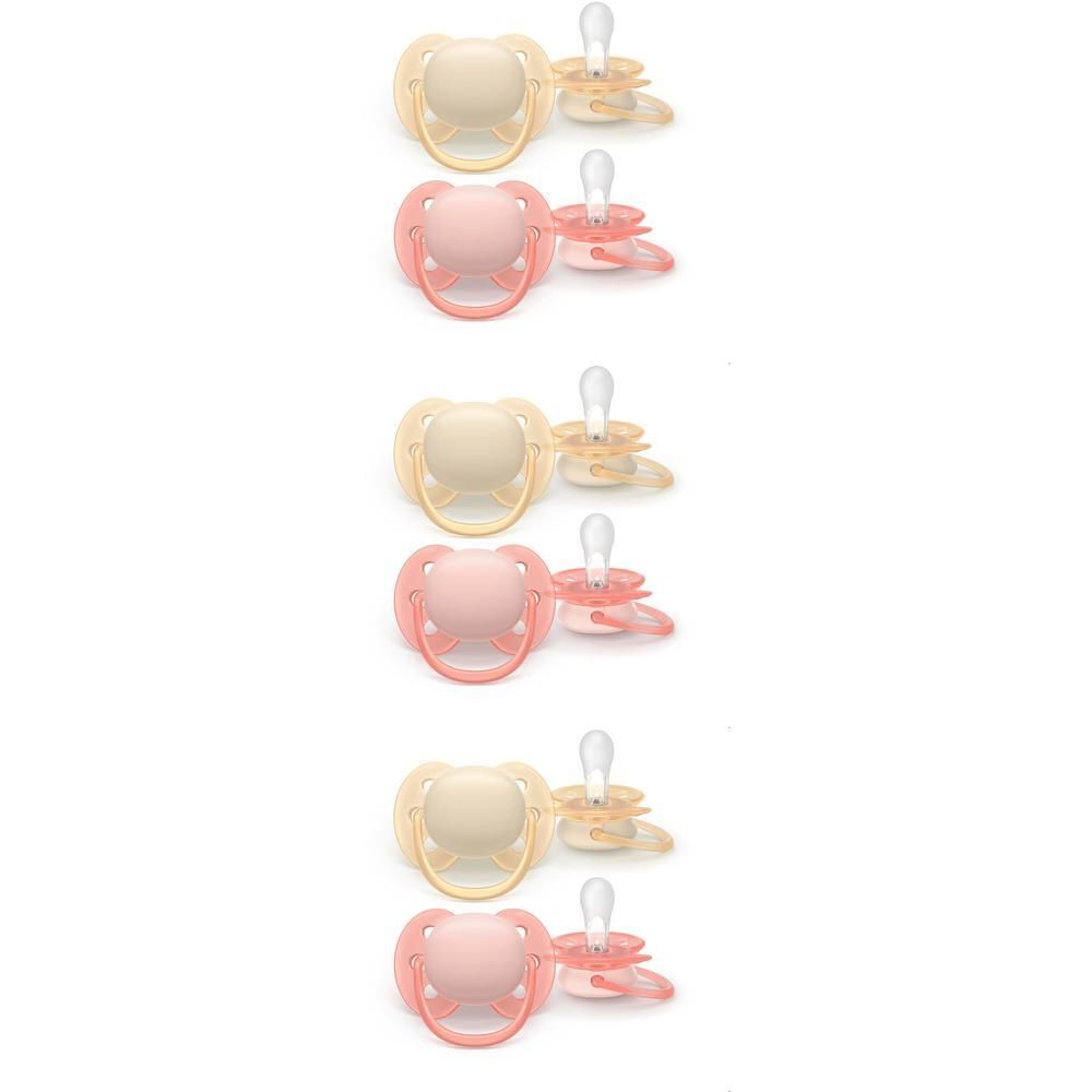Deux sucettes rose et beige, chacune avec une tétine transparente et un bouclier.