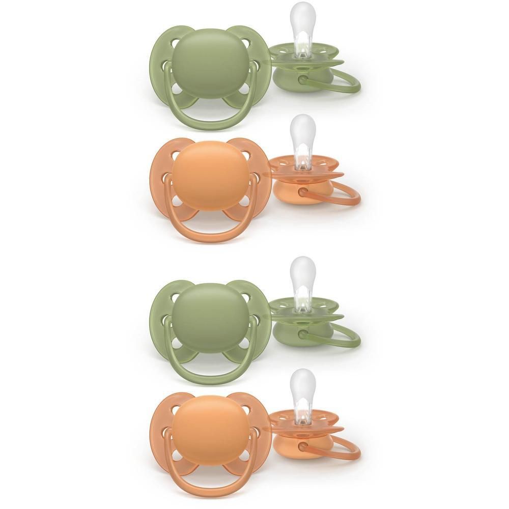 Vier fopspenen: twee groene en twee oranje.