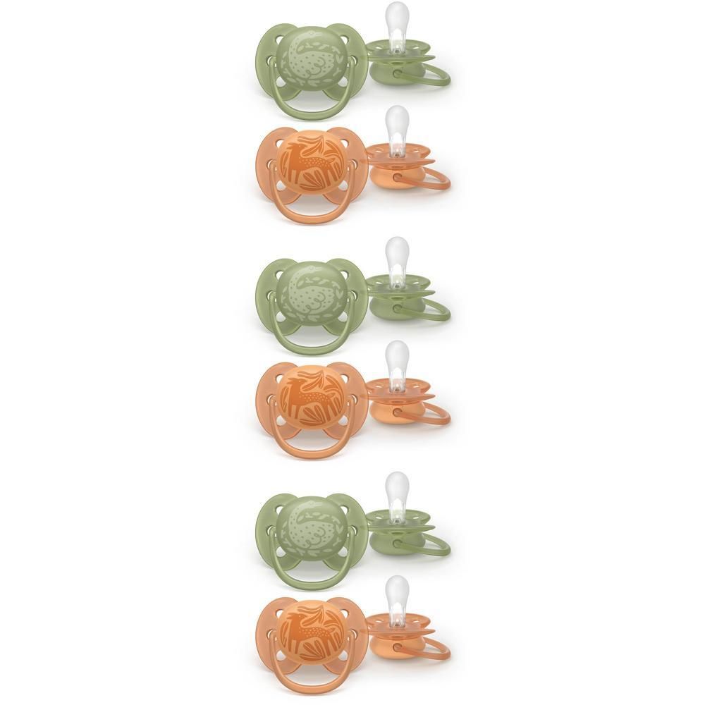 Trois sucettes vertes et trois sucettes orange avec motif animal.