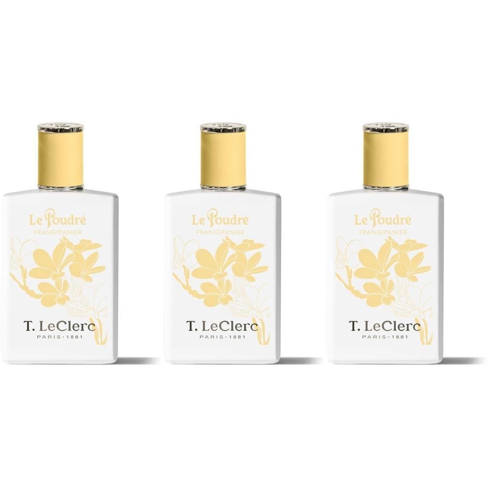 Trois flacons blancs ornés de motifs de fleurs jaunes et de bouchons dorés.