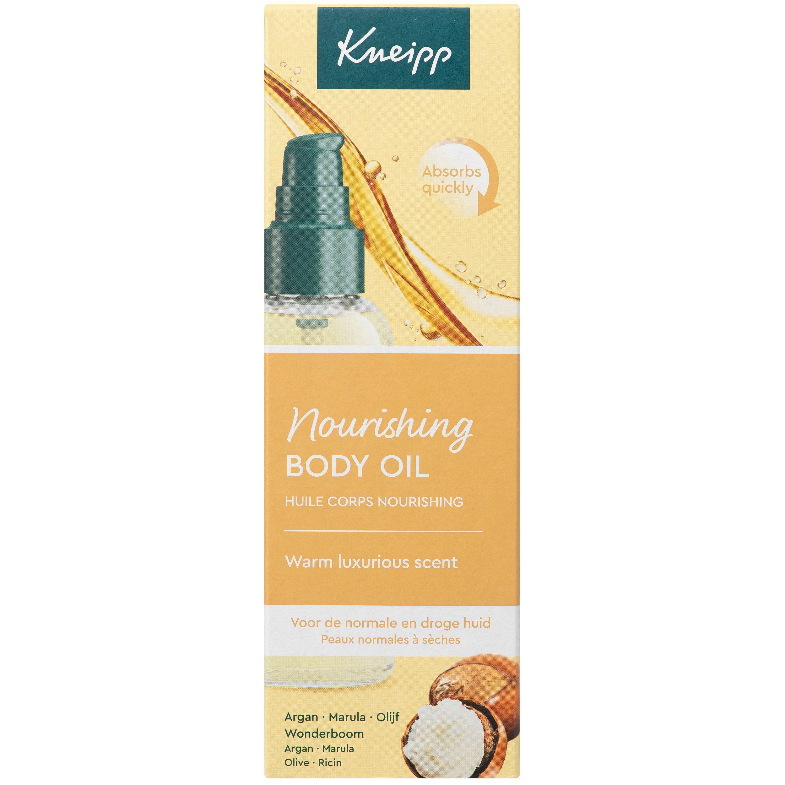 Boîte de Huile Corps Nourishing Kneipp. Montre une douche d'huile et des noix de karité. Texte : 'Absorbs quickly'.