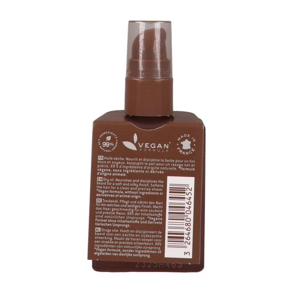 Achterkant van een Nuxe Men Boost baardolie flacon met vegan formule en herkomstindicatie.