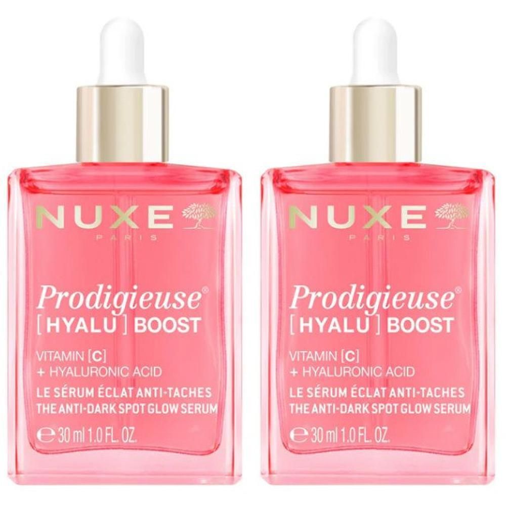 Twee Nuxe Prodigieuse [Hyalu] Boost serums met druppeldop. Roze vloeistof in glazen flacons.