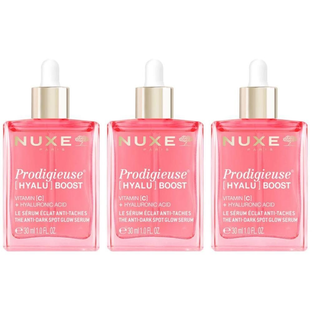 Trois sérums NUXE Prodigieuse [HYALU] Boost en flacons verre avec pipettes. Liquide rose.