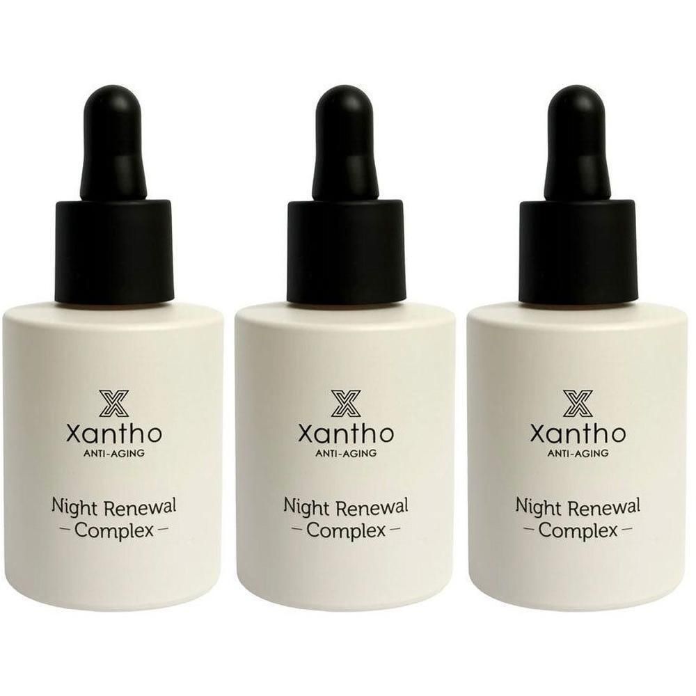 Trois flacons de Xantho Anti-Aging Night Renewal Complex avec bouchon compte-gouttes.