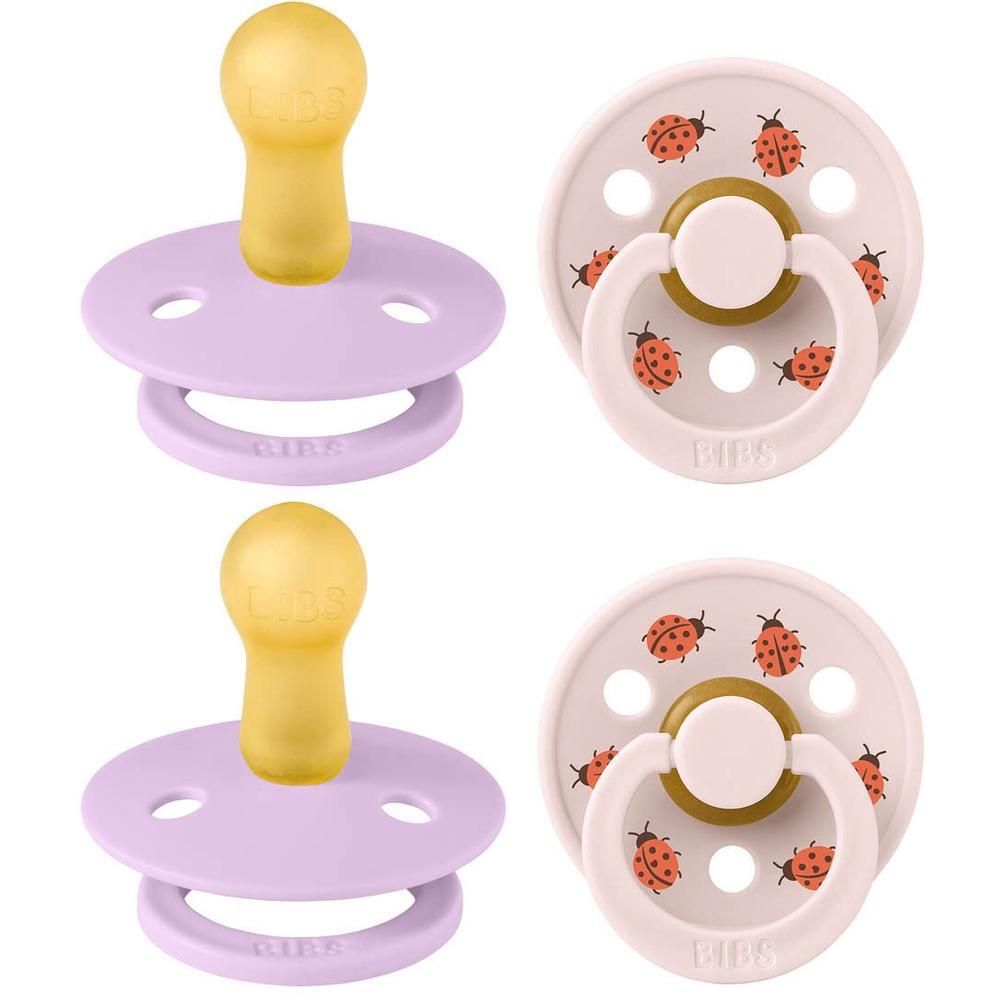 Twee ronde fopspenen in paars en roze met lieveheersbeestjesprint en gele speen.