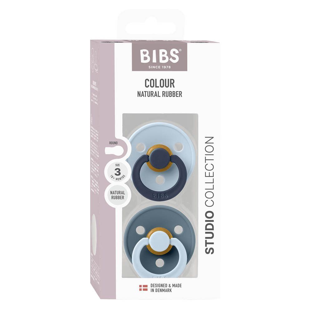 Emballage de deux sucettes BIBS en latex, taille 3, bleu clair et gris foncé.
