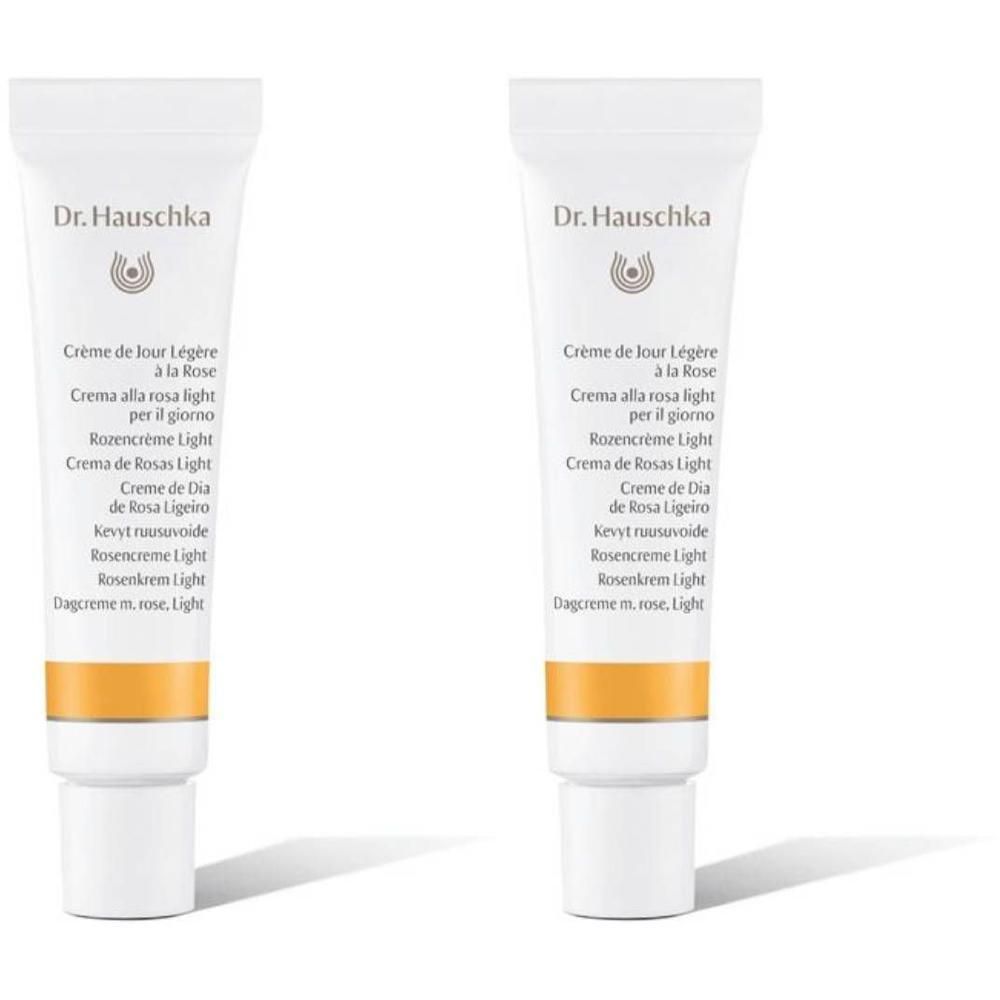 Deux tubes de Crème de Jour Légère à la Rose Dr. Hauschka avec bande jaune.
