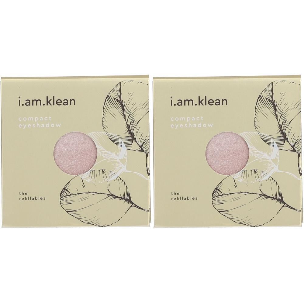 Twee verpakkingen i.am.klean compact oogschaduw in roze. De verpakking toont bladeren en de tekst 'the refillables'.