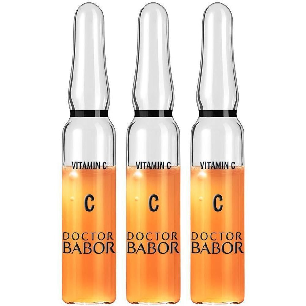 Trois ampoules en verre de sérum Vitamine C par Doctor Babor.