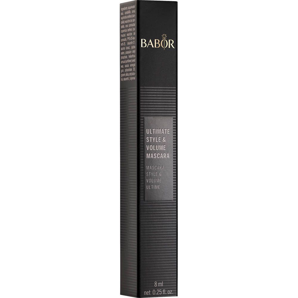 Emballage de mascara noir avec logo doré et informations produit.