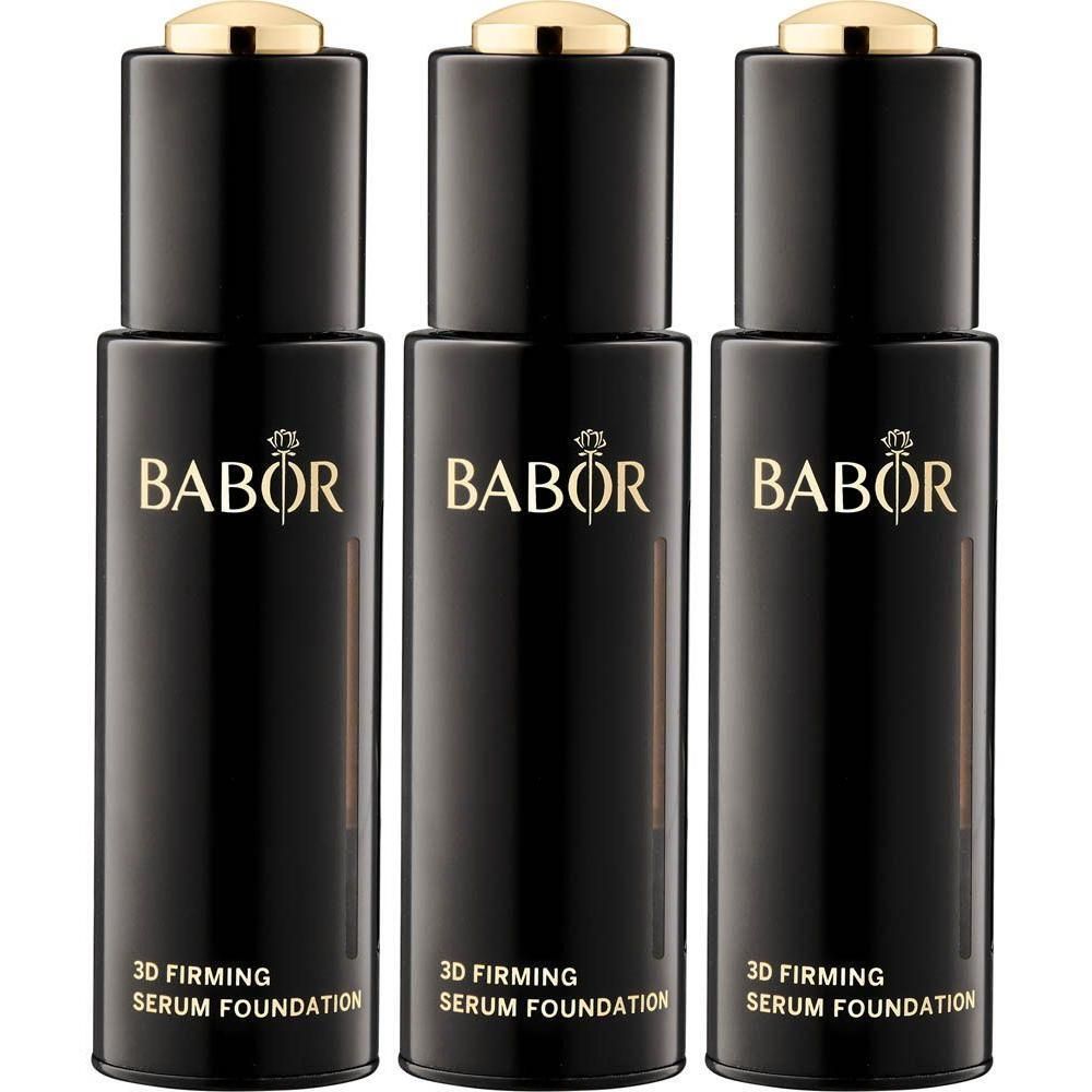 Drie zwarte flacons Babor 3D Firming Serum Foundation met gouden dopjes.