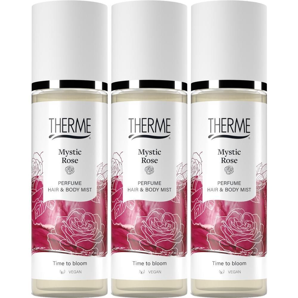 Drie flessen Therme Mystic Rose haar- en body mist met rozenprint.