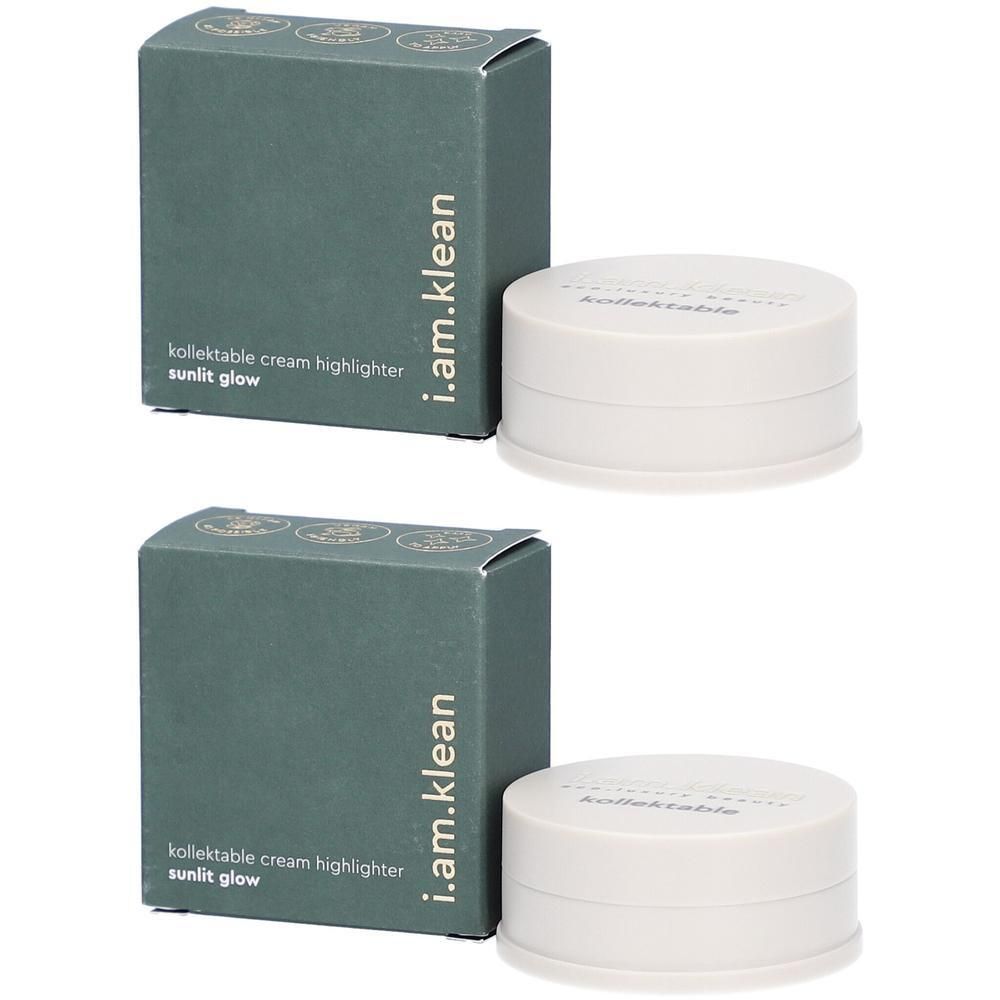 Twee potjes met lichte cream highlighter 'Sunlit Glow' en verpakking.