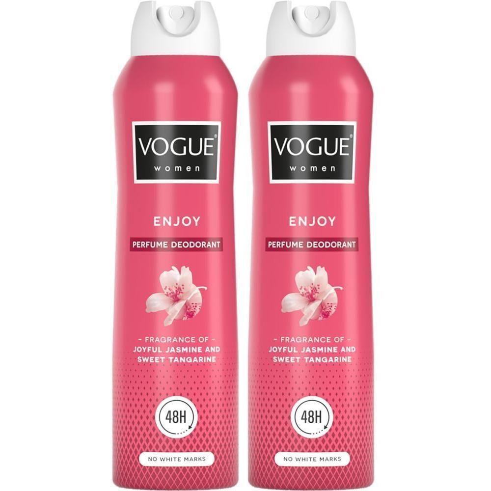 Twee roze bussen Vogue Women Enjoy Parfum Deodorant met witte doppen.