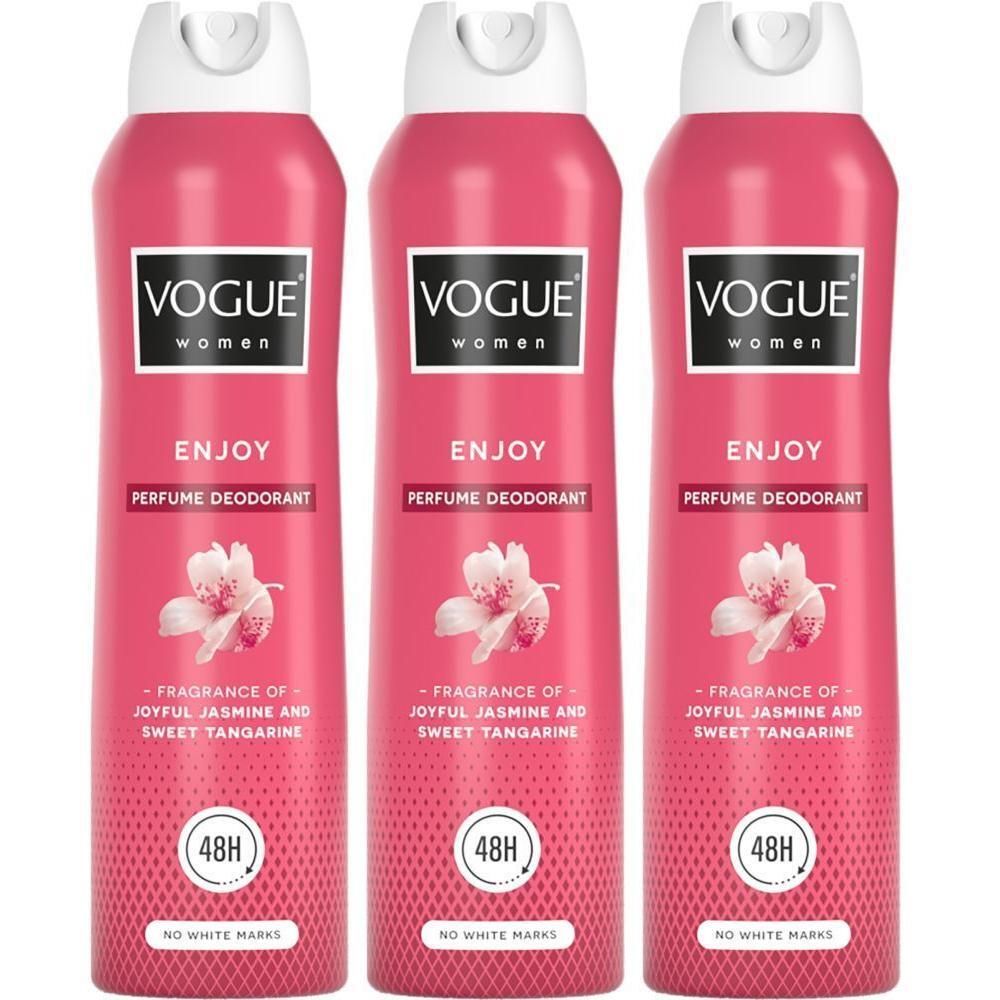 Drie roze bussen Vogue Enjoy Parfum Deodorant voor dames met jasmijn en mandarijn geur.
