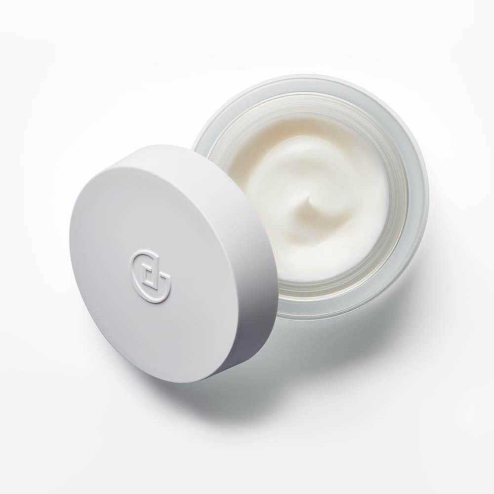 Pot en verre ouvert avec Crème Vitamine C + Acide Ferulique Collistar.
