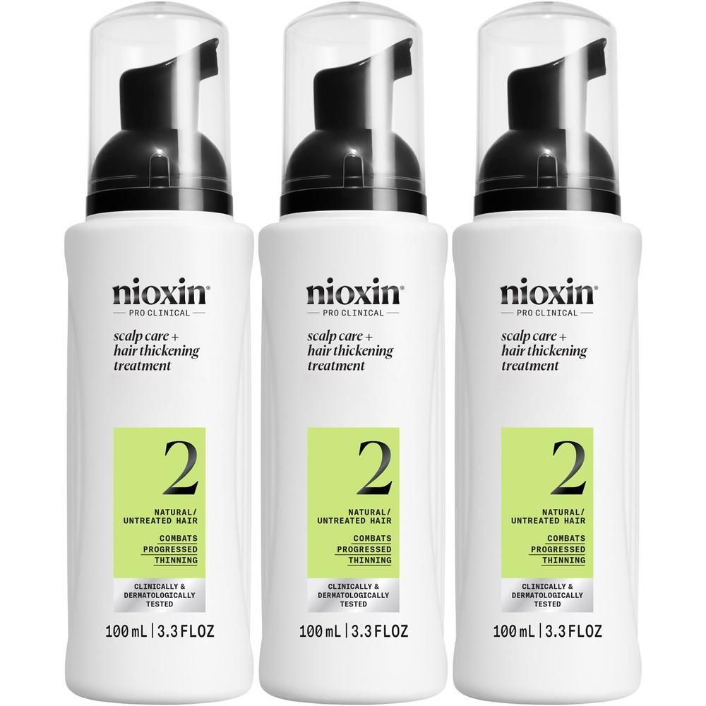 Trois flacons Nioxin Système 2 avec distributeur à pompe.