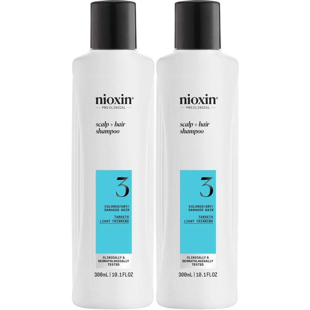 Deux bouteilles de Nioxin System 3 Shampooing pour cheveux colorés et clairsemés. Chaque bouteille contient 300 ml.